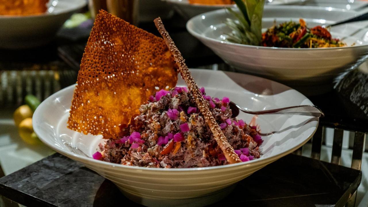 Oryx Hotel Áqaba Exterior foto A plate of kibbeh